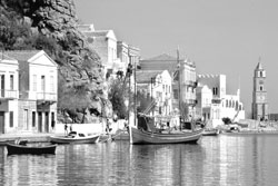 The Gialos (Symi, Greece) waterfront with its clock tower. Photos: Kinney