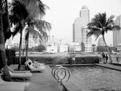 Poolside at The Peninsula Bangkok.