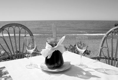 A frosty carafe of sangria at our table at Bola Marina Restaurante on Cantarriján Beach.