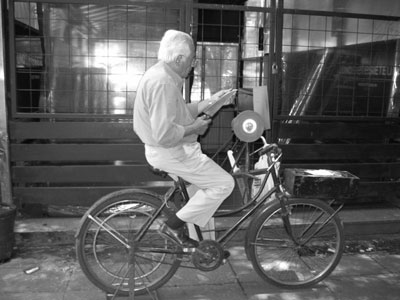 Outside his little shop in Recoleta, this man was sharpening knives on a whetstone that was attached to his stationary bike. Photos: Caplan