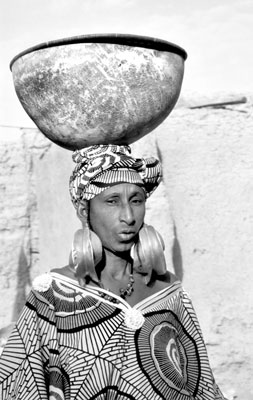 A Fulani woman wearing her wealth in her hammered-gold earrings. Photos: Jacobson