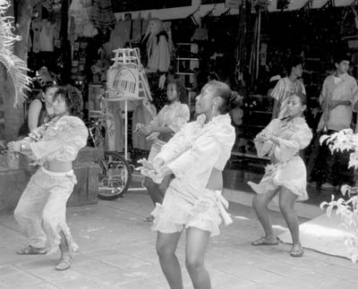 A dance troupe from the Caribbean coast of Nicaragua entertaining shoppers at the Masaya crafts market. Photo: Kimer