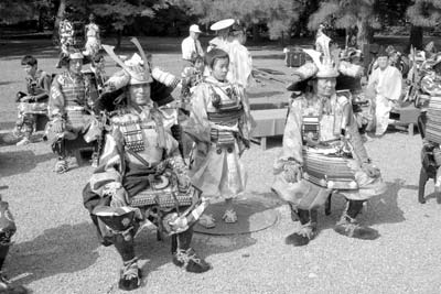 At the Festival of Ages in Kyoto (held annually on Oct. 22), participants dress in prior-period attire and celebrate the era when Kyoto was the capital. Our leader recommended going to the preparation area, where participants were willing to pose for photos, rather than the parade itself. Photos: Pyle