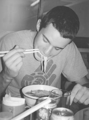 Xan quickly mastered the art of eating pho noodles with chopsticks. Photos: Carpenter