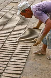 Making clay bricks in the village of San Félix.