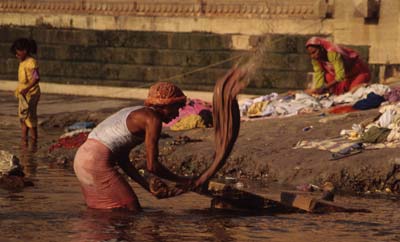 A dhobi wallah, or professional washerman,  at work.