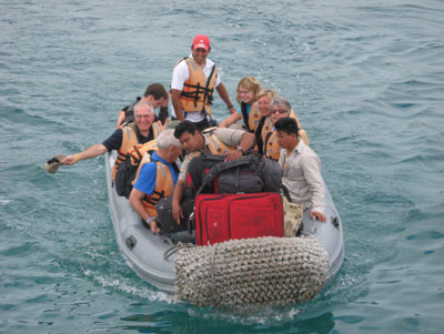 Able Zodiac drivers ferry passengers and their luggage between ship and shore.