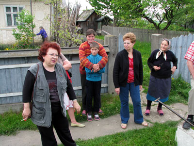 Our guide, Rodica (with cigarette), and Rose Phelan (center front) with villagers, including Mrs. Niculae. Photos: Phelan