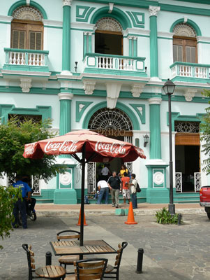 With its bright-aqua-and-white façade, Hotel Dario typifies the restored colonial buildings that lend Granada charm. 