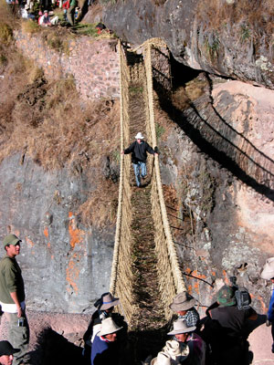 Sheila Monk crossing the traditional Inca grass bridge.