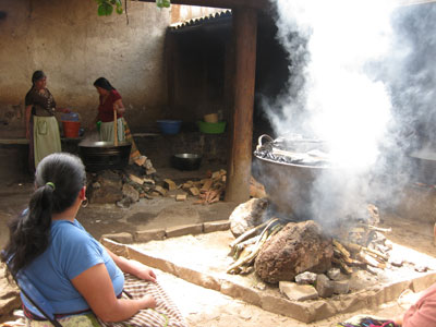 Cauldrons filled with steaming corundas and bubbling fish stew are prepared and served in the courtyard of the chapel in Santa Fe de la Laguna.