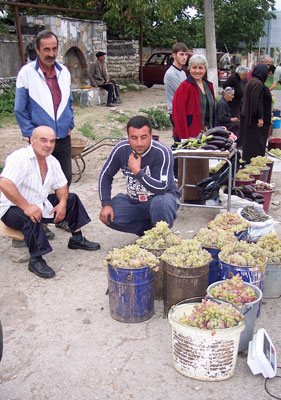 Georgian farmers selling grapes at a roadside market outside of Gurjaani, Georgia. Photo: Keck