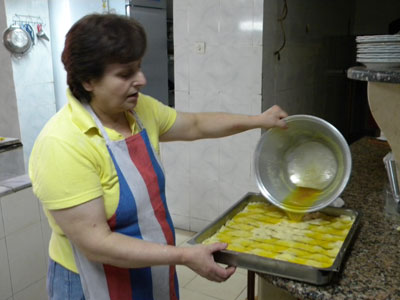 Violeta putting the finishing touch on the baklava. Photo: Sandra Scott