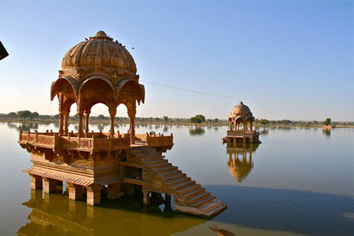 Beautifully carved chattris on Gadi Sagar Lake — Jaisalmer, India. Photo: Guy Leroy