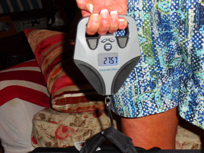 Don’s wife, Mary, demonstrates their Travelon luggage scale. Photo: Don Edmands, Jr.