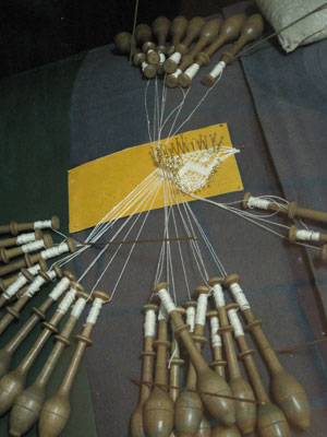 Lace bobbins in the Kantcentrum — Bruges.