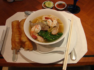 Katiev Phnom Penh (Phnom Penh noodle soup) with a side order of Yo Char Kuai (deep-fried dough). Photo: Sandra Scott