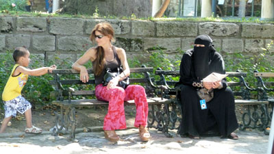 Tatiana Balesdent, who accompanied us on this trip with her husband, Bill Wood, sitting between a boy and a local woman in Istanbul. Photo: Bill Wood