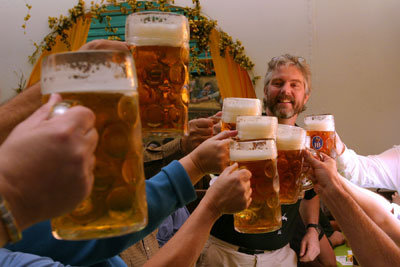 In German beer halls and beer gardens, each drink is served in a huge liter glass (called ein Mass). Men’s rooms often come with vomitoriums. Photo by Dominic Bonuccelli