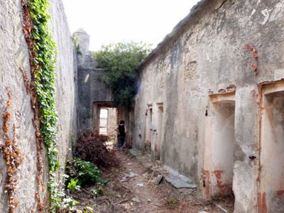 Exploring the prison cells at the abandoned Citadel in Saint-Florent.