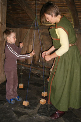 Inside one of the longhouses at the Iron Age Farm, docents in period dress explained about food, handiwork and games that could be found in Norway 1,500 years ago. Photos: Prindle