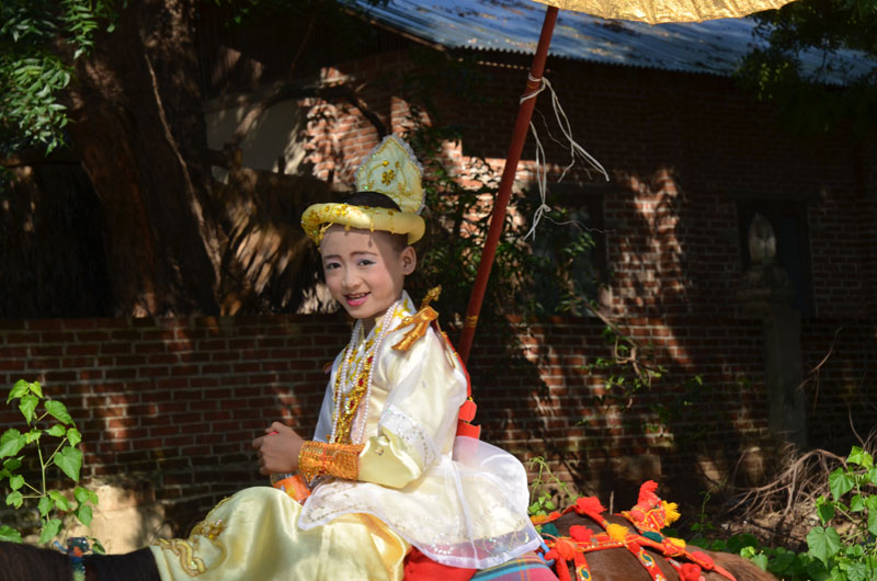 A young novice’s initiation ceremony.