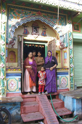 A family greeted us from their ornately painted doorway, typical of decorations on many houses in Bundi, Rajasthan. Photo by Jane B. Holt