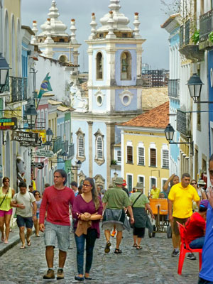 Visitors traversing the cobblestone streets of Salvador’s Pelourinho district.