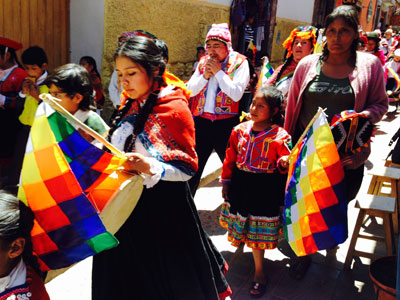 A colorful parade in Ollantaytambo.