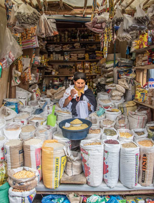 Packed Otavalo market stall.