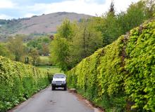 Driving the back roads (as here, in Dartmoor, England) yields surprises by the mile. Photo by Cameron Hewitt