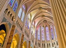 The pointed arches of Gothic cathedrals allow for dramatic stained-glass windows, such as the ones in Chartres’ cathedral. Photo by Dominic Arizona Bonuccelli