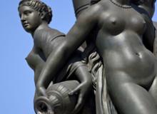 Cast in bronze, with a marble base, the Three Graces fountain (1869) in Place de la Bourse, Bordeaux, France, depicts Zeus’ daughters Aglaea (Splendor), Euphrosyne (Mirth) and Thalia (Good Cheer).