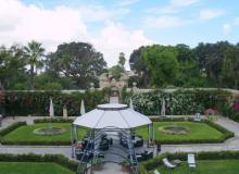 Ornate wrought-iron gates lead to the less-formal second garden.