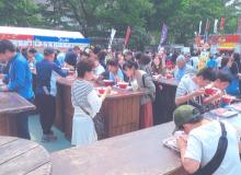 People sampling various types of ramen at the Sapporo Ramen Show. Photo by Stanley Osur