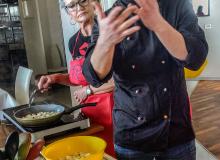 Chef Massimo Tomarchio showing the class how to prepare caponata, which included eggplant, zucchini, pine nuts, raisins, capers and other goodies.