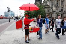 Sampling one of Germany’s hundreds of varieties of sausage from a street vendor is a classic German experience.