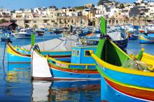 According to tradition, the colors of these Maltese fishing boats represent a fisherman’s home village. Photo by Gretchen Strauch