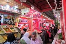 People shopping for food in Meknes' medina a few days before the start of Ramadan. Photo by Stephen Addison