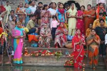 Women waiting to offer Chhath prayers at the Ganges River in Varanasi, India. Photo by Wanda Bahde