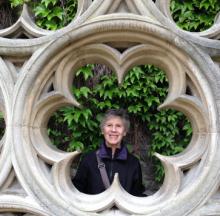 Marilyn Hill in the garden near the entrance to Hôtel de Sully, which is near Place des Vosges in Paris. Photo by Linda Hill