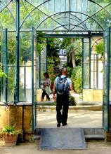 Visitors strolling through the glasshouse in Orto Botanico, Sicily, Italy. Photo by Yvonne Michie Horn