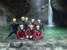 Joanne Kuzma (front center) and group canyoning in Slovenia.