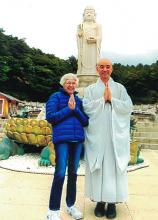 Sandra Yon and a monk at the Donghwasa Temple in Daegu.