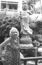 Jane O’Brien and the statue of Lady Linshui at Lady Linshui Temple in Tainan, Taiwan.