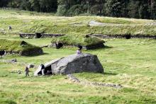 The Iron Age Farm at Ullandhaug, Norway, consists of two longhouses, smaller buildings, wells, stone fences and burial mounds from AD 350 to 550.