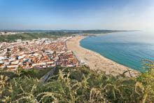 Nazaré hugs its wide beach on the Atlantic. Photo by Dominic Arizona Bonuccelli