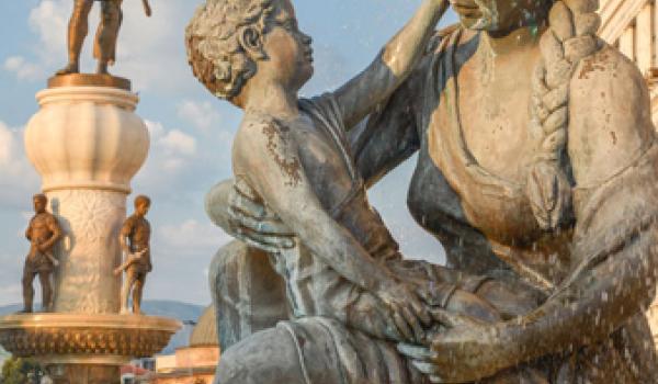 One of four statues of mothers around the Fountain of the Mothers of Macedonia in Skopje, North Macedonia. In the background, on a 15-meter-tall platform, is a 13-meter-tall bronze statue of Philip II, father of Alexander the Great.