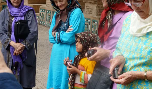 A tour member and (center) Bune Primack, wearing clothes they bought in Iran, sp