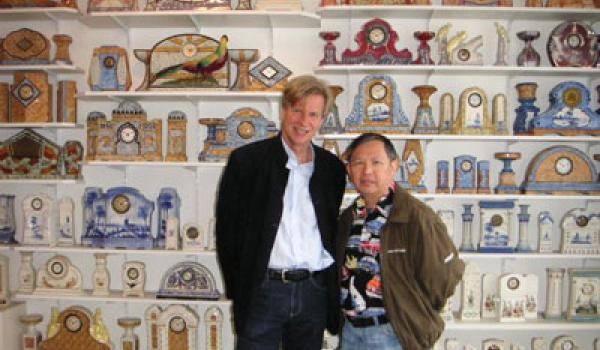 Selliers and visitor Lawrence Peacock in front of a selection of Jacques’ clocks